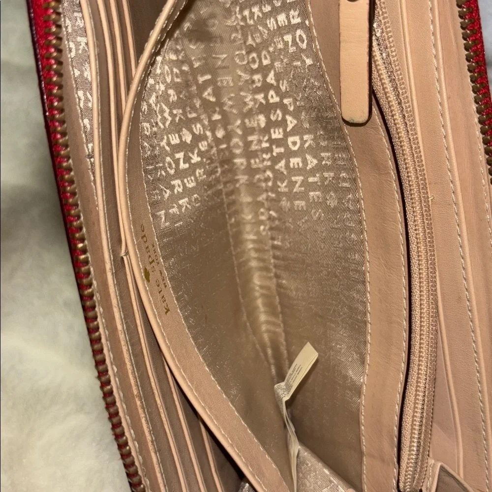 Kate Spade Red Pebbled Leather Zip Around Wallet with Logo Plate